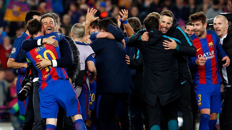 Luis Enrique and Lionel Messi embrace after the final whistle