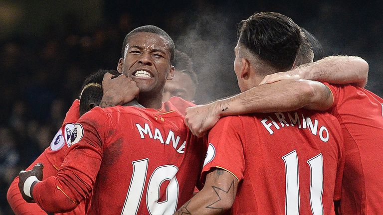 Liverpool players celebrate Sadio Mane's winner against Everton