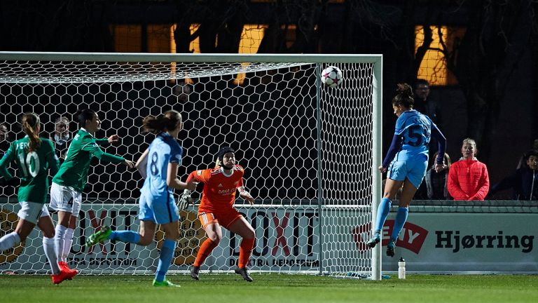 Carli Lloyd of Manchester City scores the 1-0 goal against Goalkeeper Maria Christensen of Fortuna Hjorring during the UEFA Wo