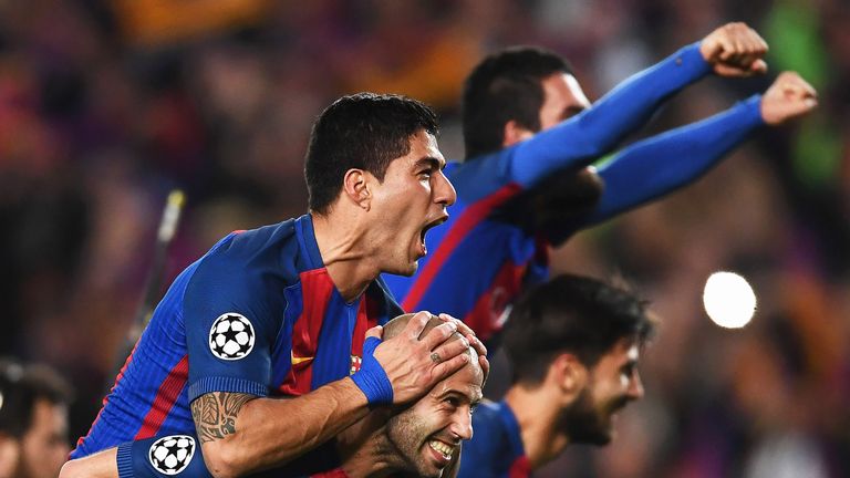 Luis Suarez and Javier Mascherano celebrate the 6-1 (6-5 agg) victory over PSG at Camp Nou