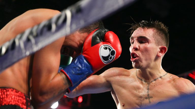 NEW YORK, NY - MARCH 17:  Michael Conlan (R) throws a right hand to the head of Tim Ibarra during their super bantamweight bout at The Theater at Madison S