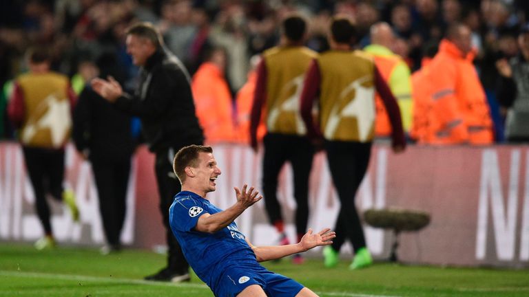 Leicester City's English midfielder Marc Albrighton celebrates scoring their second goal during the UEFA Champions League round of 16 second leg football m