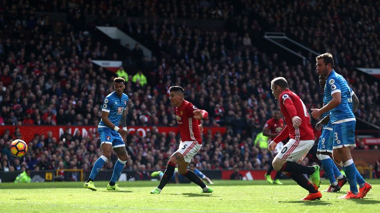 MANCHESTER, ENGLAND - MARCH 04:  Marcos Rojo of Manchester United (C) scores his sides first goal during the Premier League match between Manchester United