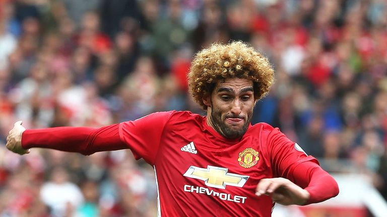 Marouane Fellaini in action during the Premier League match between Manchester United and Manchester City at Old Trafford