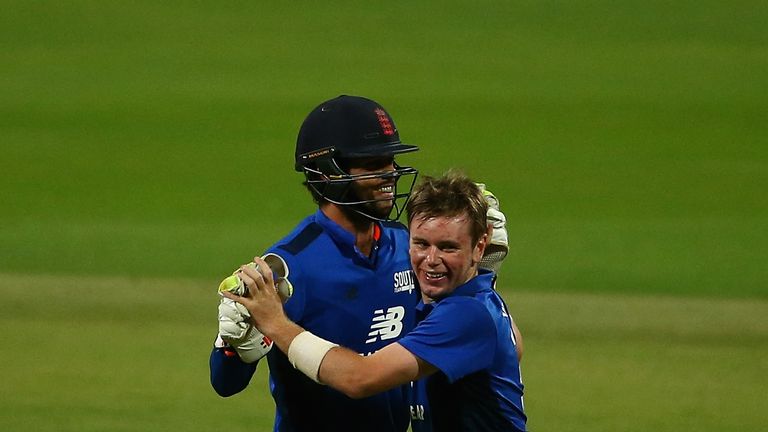 Mason Crane of The South celebrates with teammates after dismissing Liam Livingstone of The North