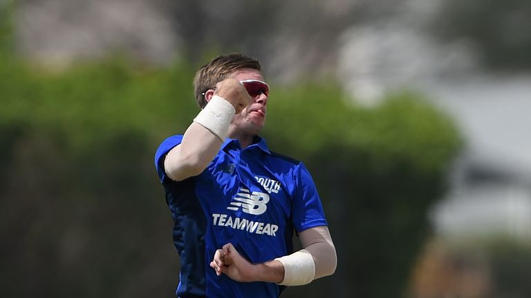DUBAI, UNITED ARAB EMIRATES - MARCH 15:  Mason Crane of The South bowls during their warm up session prior to the ECB North versus South Series on March 15