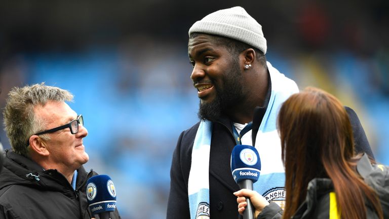 MANCHESTER, ENGLAND - FEBRUARY 05:  NFL player, Menelik Watson is interviewed prior to the Premier League match between Manchester City and Swansea City at