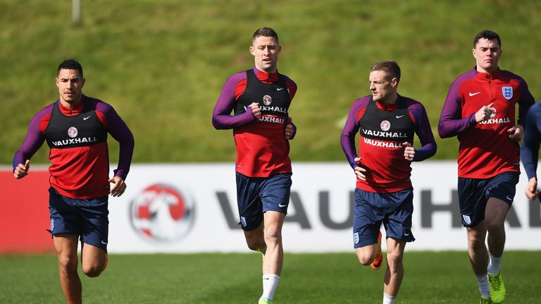 (L-R) Jake Livermore, Gary Cahill, Jamie Vardy and Michael Keane of England warm up 