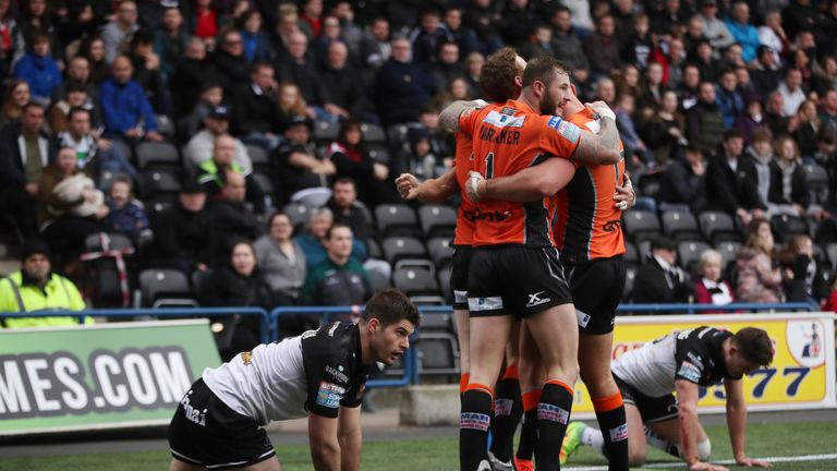 Castleford Tigers Mike McMeeken is mobbed by his team mates