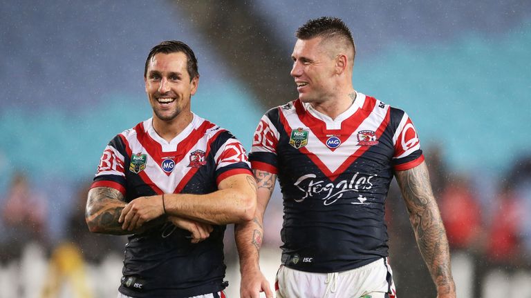 SYDNEY, AUSTRALIA - MARCH 23:  Mitchell Pearce (L) and Shaun Kenny-Dowall (R) of the Roosters celebrate victory after the round four NRL match between the 