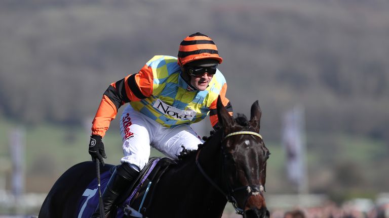 Mite Bite ridden by Nico de Boinville on their way to winning the RSA Novices’ Chase during Ladies Day at Cheltenham Festival