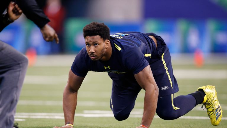 Myles Garrett of Texas A&M participates in a drill during day five of the NFL Combine 