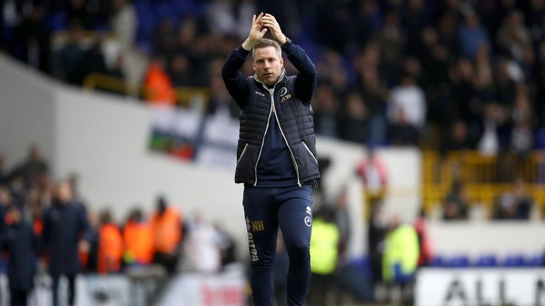 LONDON, ENGLAND - MARCH 12:  Neil Harris, manager of Millwall appluads the travelling fans after defeat in The Emirates FA Cup Quarter-Final match between 
