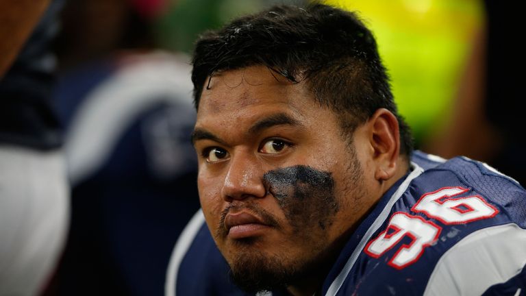 ARLINGTON, TX - OCTOBER 11:  Defensive tackle Sealver Siliga #96 of the New England Patriots on the sidelines during the second half of the NFL game agains
