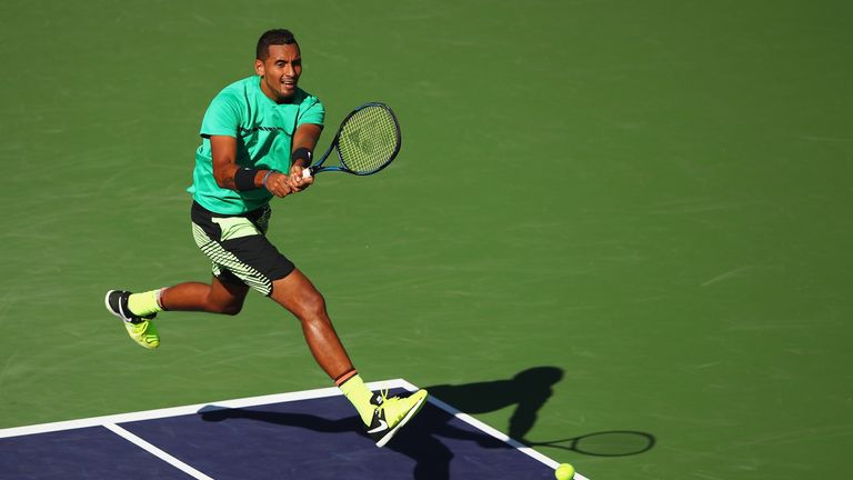 INDIAN WELLS, CA - MARCH 15:  Nick Kyrgios of Australia plays a backhand during his straight set victory against Novak Djokovic of Serbia in their fourth r