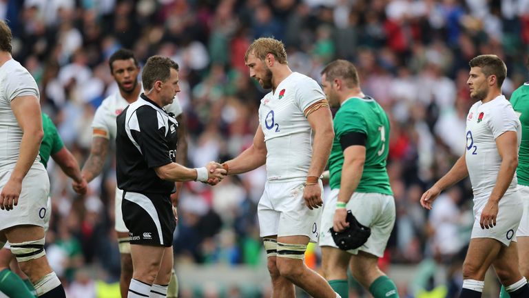 LONDON, ENGLAND - SEPTEMBER 05: Referee Nigel Owens shakes hands with Chris Robshaw of England  during the QBE International match between England and Irel