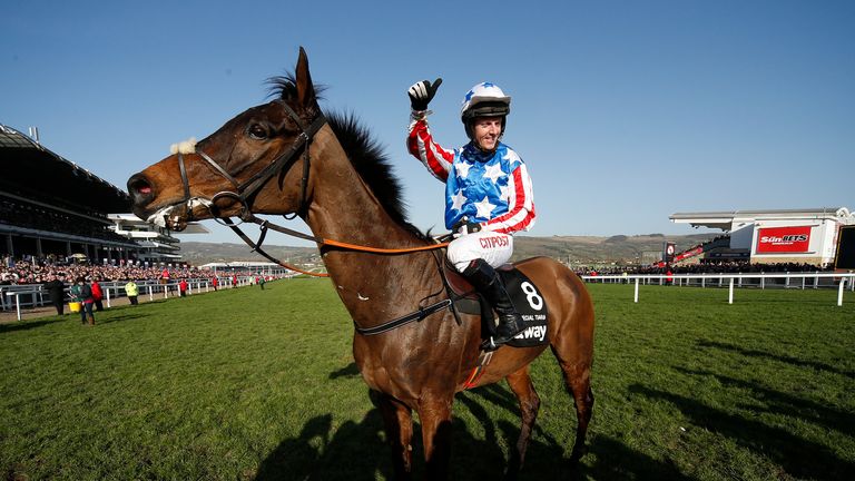 CHELTENHAM, ENGLAND - MARCH 15: Noel Fehily riding Special Tiara celebrate winning The Betway Quenn Mother Champion Chase at Cheltenham racecourse on day t