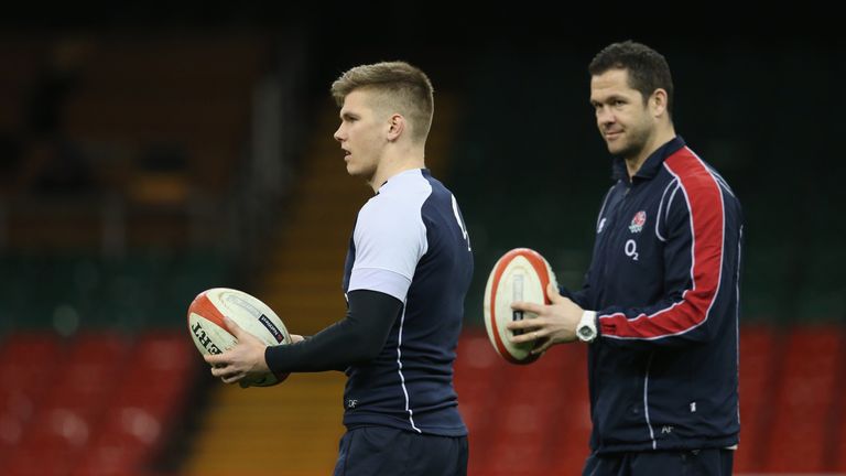 CARDIFF, WALES - MARCH 15:  Owen Farrell, (L) the England standoff, looks on with his father and England backs coach, Andy Farrell during the England capta