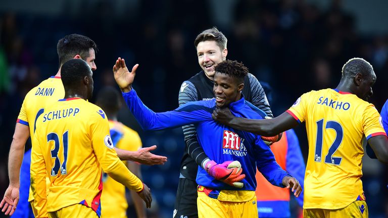 WEST BROMWICH, ENGLAND - MARCH 04: Wilfried Zaha of Crystal Palace (C) celebrates with his Crystal Palace team mates after the Premier League match between