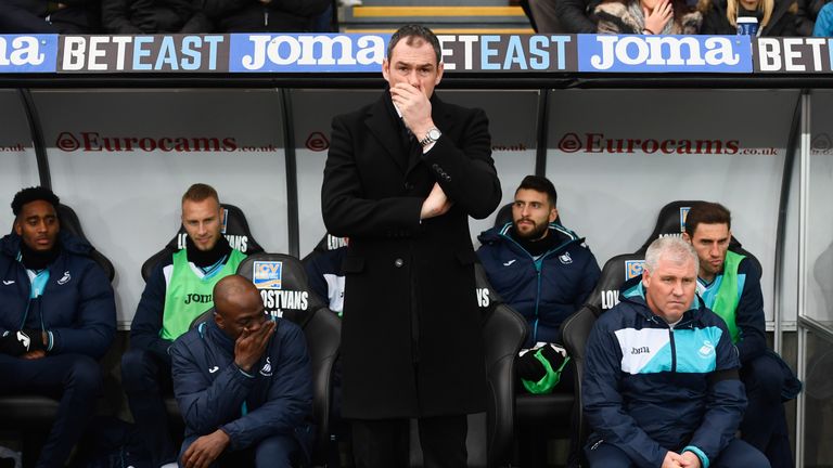 Clement (centre) believes the next four games will be 'crucial' for Swansea
