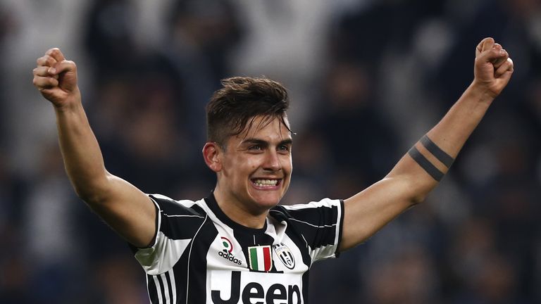 Juventus' forward from Argentina Paulo Dybala celebrates after scoring during the Italian Serie A football match Juventus Vs AC Milan on March 10, 2017 at 