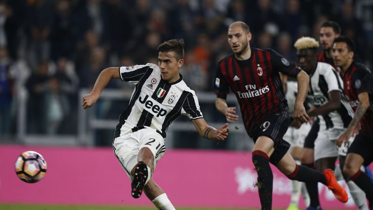 Juventus' forward Paulo Dybala from Argentina scores a penalty during the Italian Serie A football match Juventus Vs AC Milan on March 10, 2017 at the 'Juv