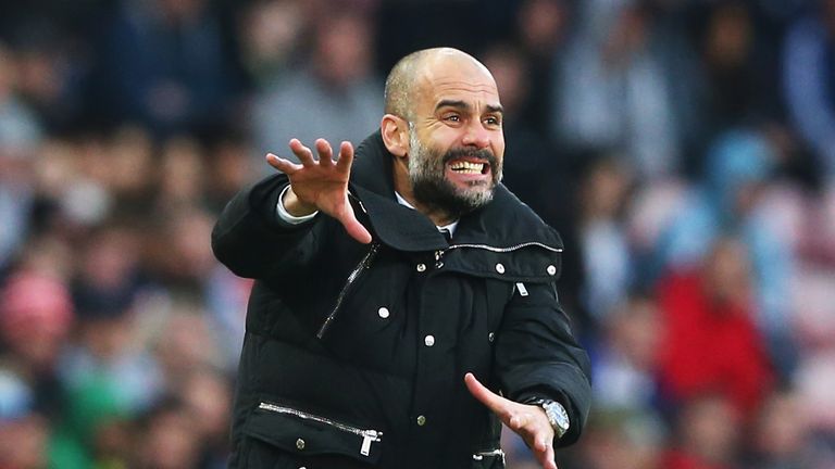SUNDERLAND, ENGLAND - MARCH 05: Josep Guardiola, Manager of Manchester City gives his team instructions during the Premier League match between Sunderland 