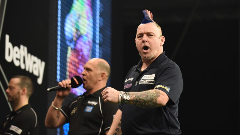 Peter Wright put in a spectacular display to see off Adrian Lewis