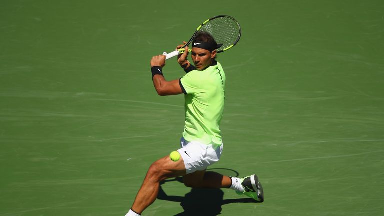 INDIAN WELLS, CA - MARCH 14:  Rafael Nadal of Spain plays a backhand against Fernando Verdasco of Spain in their third round match during day nine of the B
