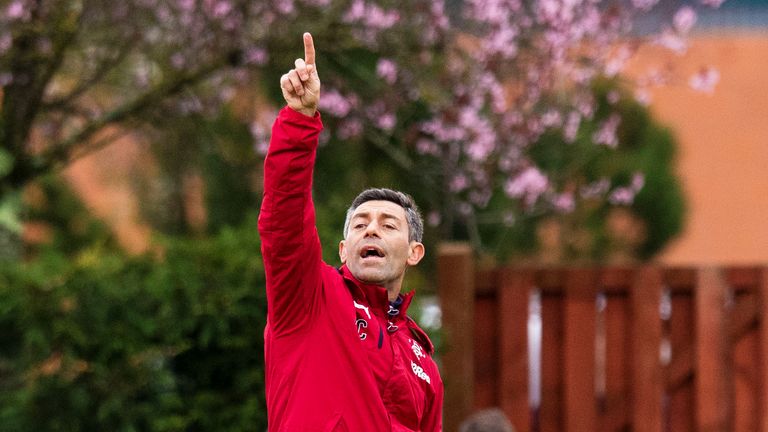 Rangers manager Pedro Caixinha issues instructions at training.