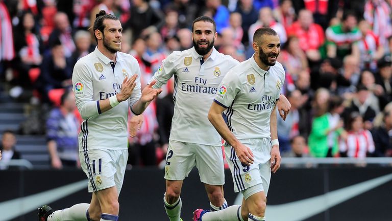 Real Madrid forward Karim Benzema (right) celebrates Gareth Bale and Daniel Carvajal after scoring