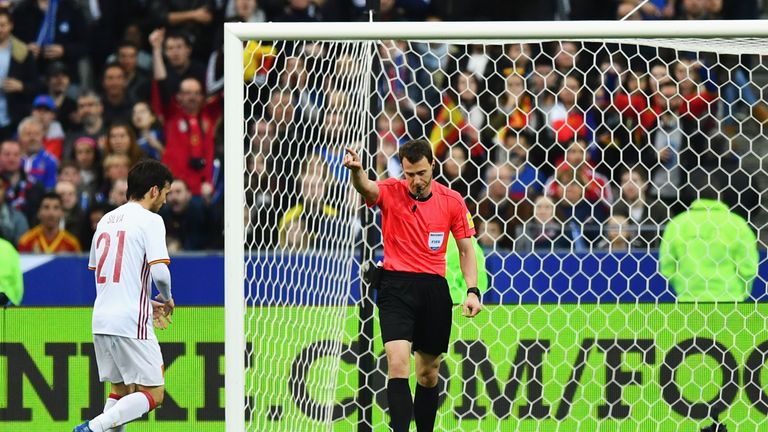 PARIS, FRANCE - MARCH 28: Referee Felix Zwayer awards Spain's second goal by Gerard Deulofeu after a review during the International Friendly match between