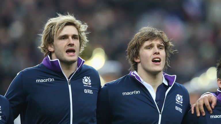 PARIS, FRANCE - FEBRUARY 07:  Richie Gray (L) and his brother Jonny Gray of Scotland line up for the anthems during the RBS Six Nations match between Franc