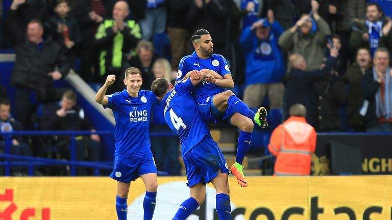 LEICESTER, ENGLAND - MARCH 04:  Riyad Mahrez of Leicester City (R) celebrates scoring his sides second goal with Danny Drinkwater of Leicester City (L) dur