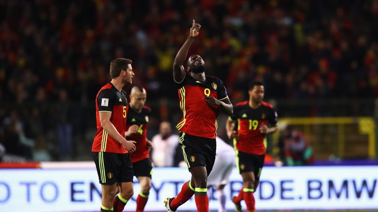 BRUSSELS, BELGIUM - MARCH 25:  Romelu Lukaku of Belgium celebrates scoring his teams first goal of the game with team mates uring the FIFA 2018 World Cup G