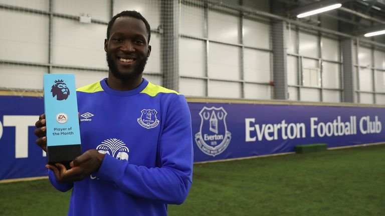 Romelu Lukaku collects his Premier League player of the month award for March