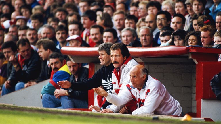 Liverpool manager Graeme Souness (C) with backroom staff Phil Boersma (L) and Ronnie Moran (R) in the Anfield dug out during a match circa 1991