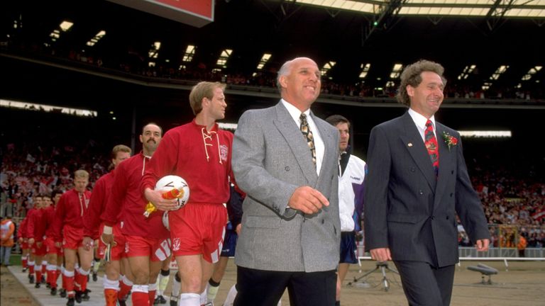 1992:  Ronnie Moran of Liverpool and Malcom Crosby of Sunderland lead their teams out before the FA Cup final at Wembley Stadium in London. Liverpool won t