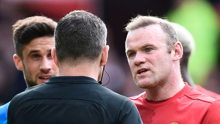 Wayne Rooney (right) confronted referee Kevin Friend after Andrew Surman pushed Zlatan Ibrahimovic