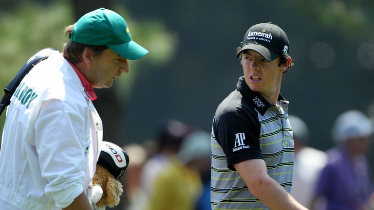 AUGUSTA, GA - APRIL 10:  Rory McIlroy of Northern Ireland (R) talks with caddie J.P. Fitzgerald during the final round of the 2011 Masters Tournament at Au