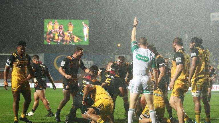 The Chiefs players celebrate Brodie Retallick's try