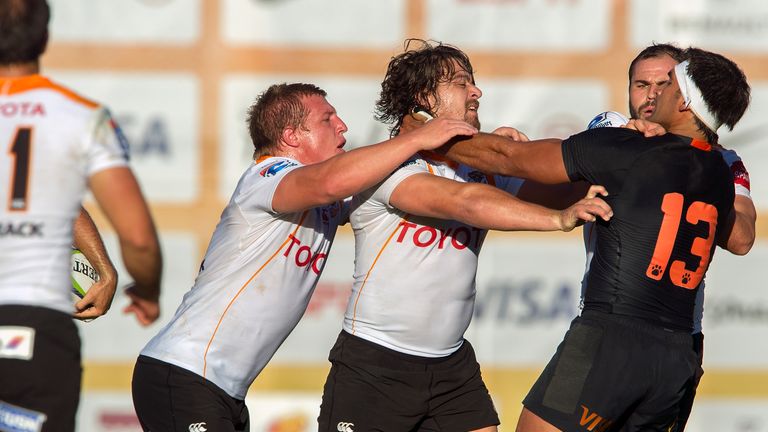 jaguares centre Matias Orlando (R) clashes with Clinton Swart