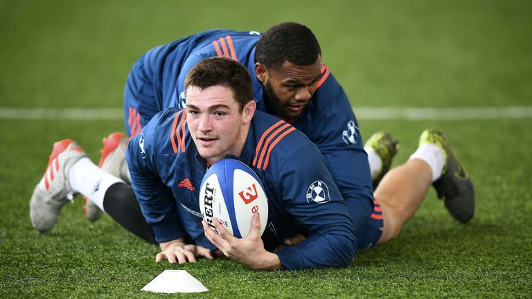 France flanker Fabien Sanconnie (left) vies with Virimi Vakatawa during a training session