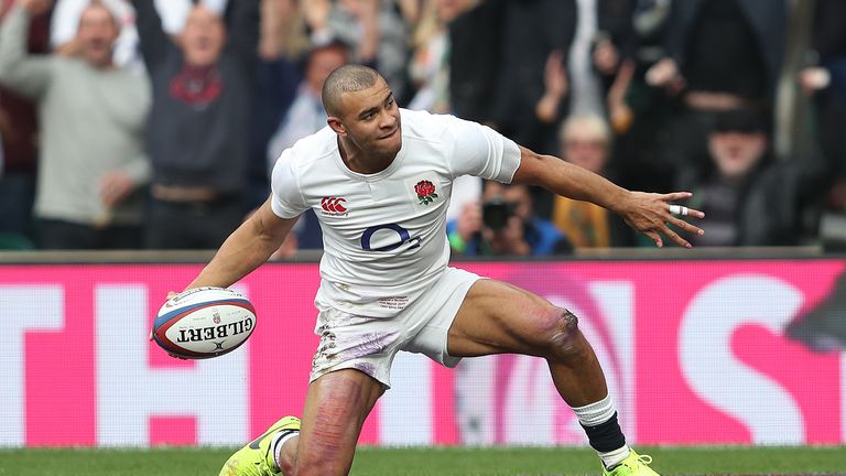 Jonathan Joseph celebrates scoring his first try against Scotland