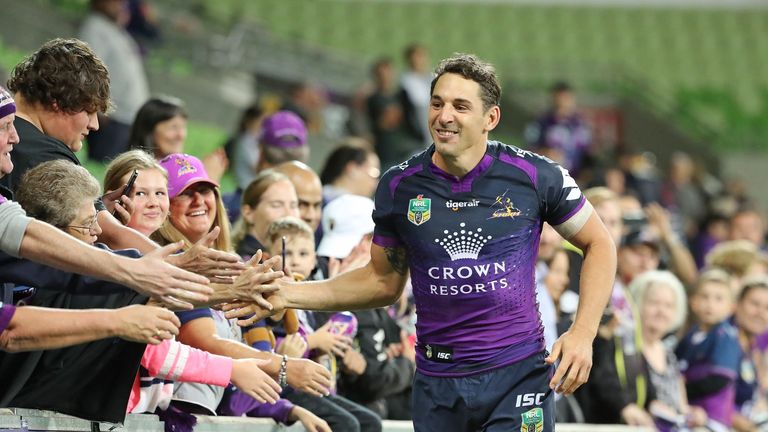 Billy Slater celebrates with supporters after Melbourne's win over Brisbane