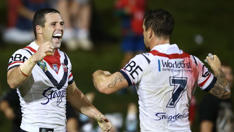 Michael Gordon (left) celebrates scoring a try against Penrith with team-mate Mitchell Pearce