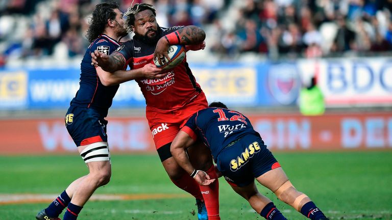Mathieu Bastareaud is tackled by Grenoble's Nigel Hunt (right) and Fabien Alexandre