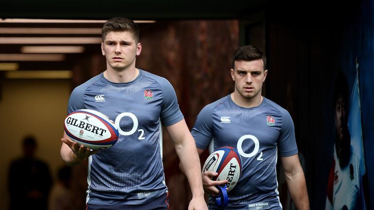 Owen Farrell (L) and George Ford walk out for the warm up prior to England's Six Nations clash with Scotland
