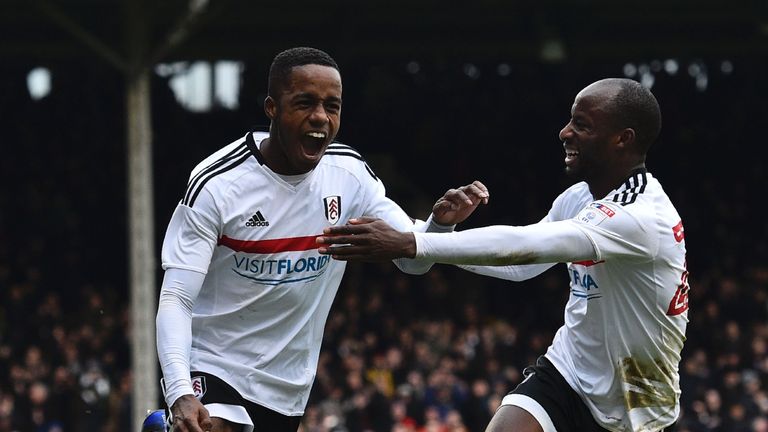 Fulham's English defender Ryan Sessegnon (L) celebrates scoring their third goal during the English FA Cup fourth round football match between Fulham and H