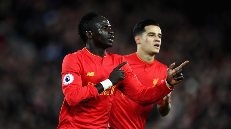 LIVERPOOL, ENGLAND - MARCH 04:  Sadio Mane of Liverpool celebrates scoring his sides second goal during the Premier League match between Liverpool and Arse